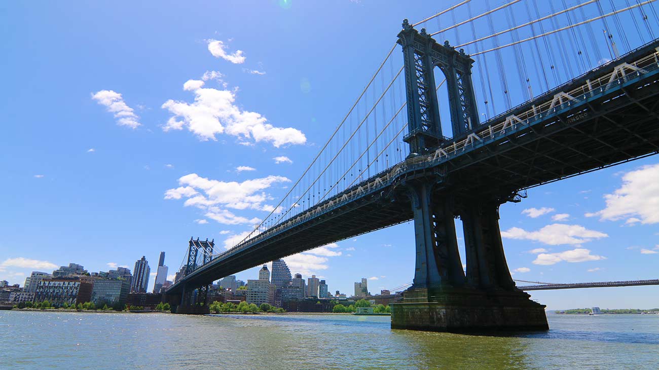 Manhattan Bridge seen from the water during a sunset cruise